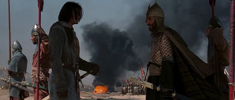 Screencapture of Balian and Salah ad-Din in front of a burning siege tower